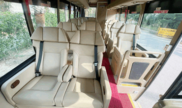 16 seater sml isuzu ultra luxury coach with toilet washroom fridge heater hire in delhi