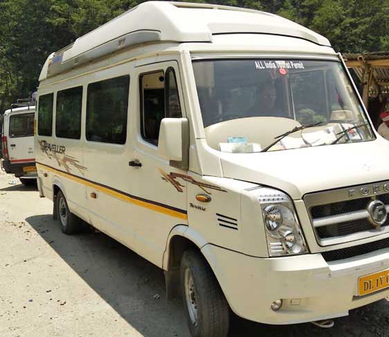 9 seater deluxe 1x1 tempo traveller hire delhi