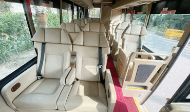 16 seater sml isuzu luxury coach with toilet washroom hire in delhi